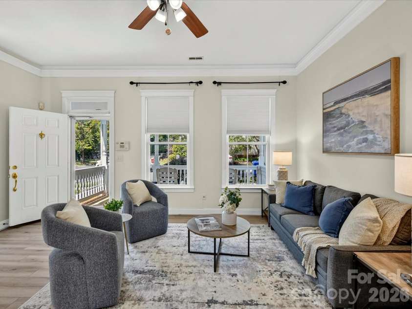 13106 Kennerly Drive, Huntersville, NC 28078.  MLS# CAR4402460, YatesRealty ID 37992. Designed for both comfort and functionality, the light-filled Great Room features a gas fireplace, crown molding, and an open layout that flows effortlessly into the home's gathering spaces.