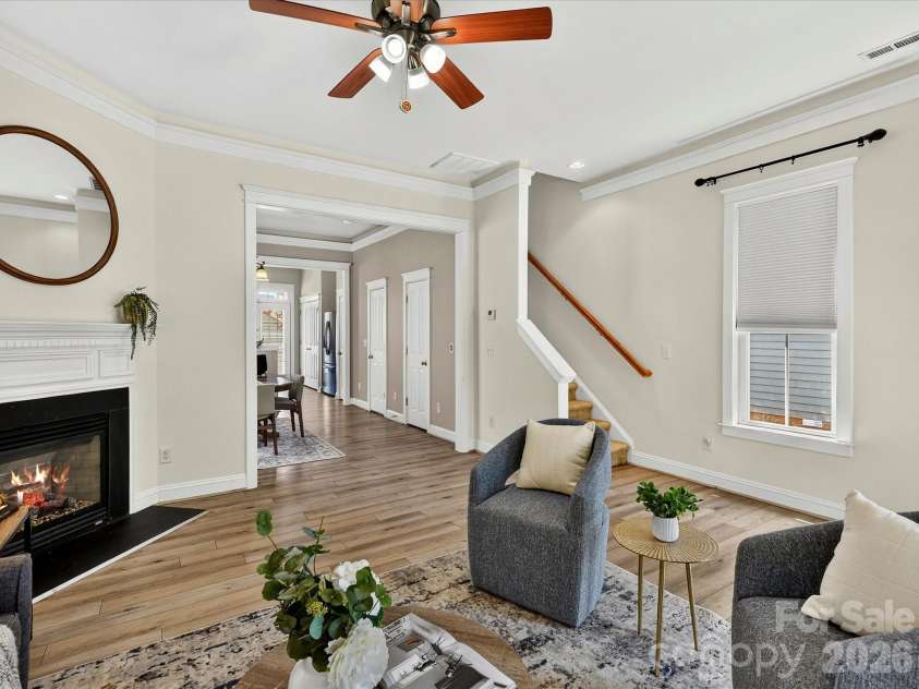 13106 Kennerly Drive, Huntersville, NC 28078.  MLS# CAR4402460, YatesRealty ID 37992. Designed for both comfort and functionality, the light-filled Great Room features a gas fireplace, crown molding, and an open layout that flows effortlessly into the home's gathering spaces.