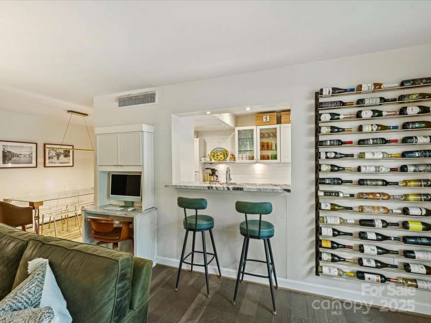 1300 Queens Road, Charlotte, NC 28207.  MLS# CAR4283635, YatesRealty ID 3800. Kitchen Bar, Custom Desk with Granite Top