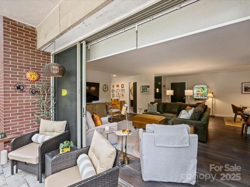 1300 Queens Road, Charlotte, NC 28207.  MLS# CAR4283635, YatesRealty ID 3800. Sliding Doors Open to Create One Big Room