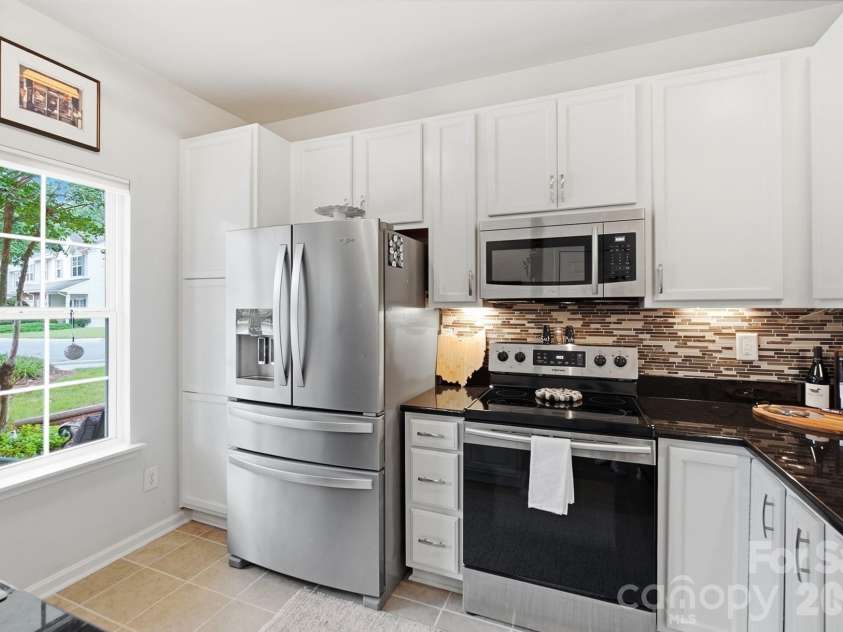 203 Tail Race Lane, Fort Mill, SC 29715.  MLS# CAR4402289, YatesRealty ID 38003. Natural light in Kitchen