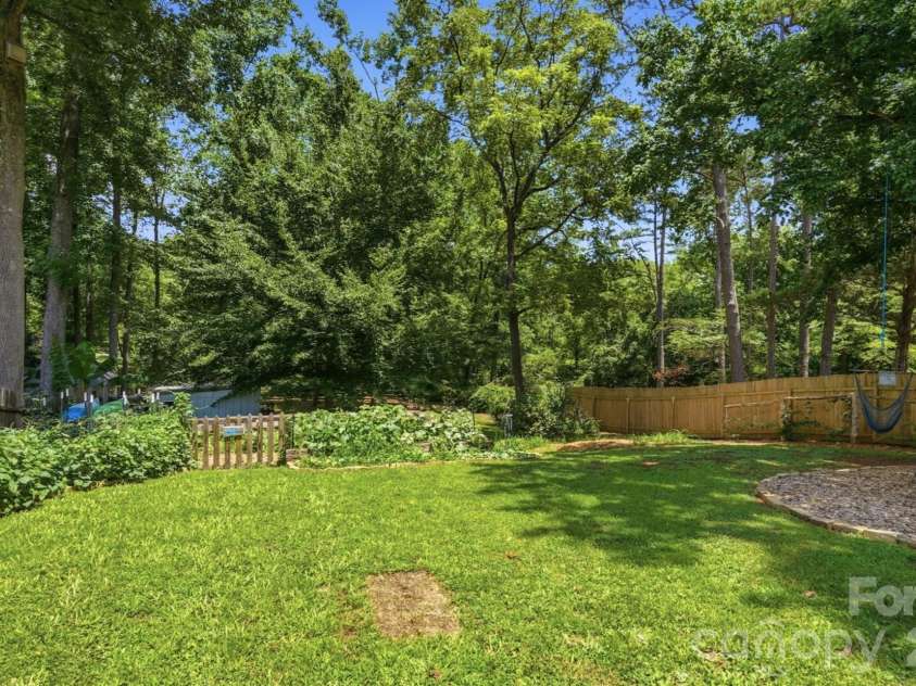 7112 Walterboro Road, Charlotte, NC 28227.  MLS# CAR4403762, YatesRealty ID 38005. Large Grass Area
