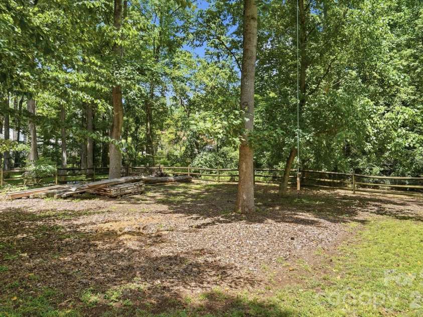 7112 Walterboro Road, Charlotte, NC 28227.  MLS# CAR4403762, YatesRealty ID 38005. Shaded Backyard Oasis