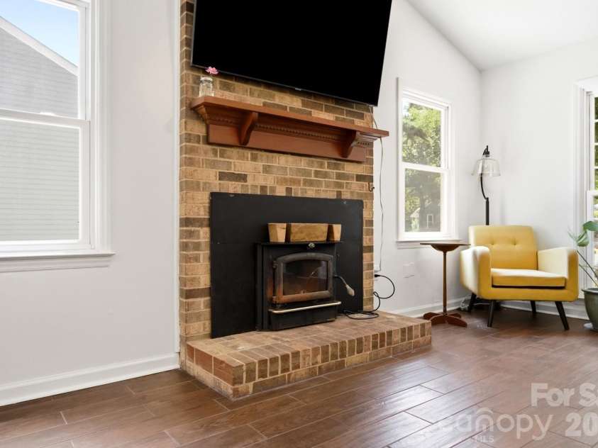 7112 Walterboro Road, Charlotte, NC 28227.  MLS# CAR4403762, YatesRealty ID 38005. Stunning Brick Fireplace