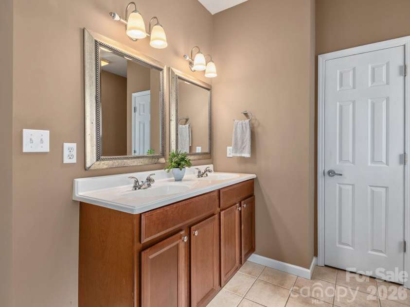 509 Shamrock Drive, Asheville, NC 28803.  MLS# CAR4402725, YatesRealty ID 38014. Primary bathroom double vanity