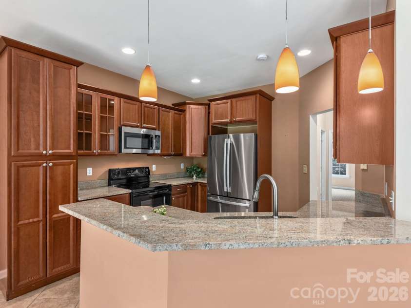 509 Shamrock Drive, Asheville, NC 28803.  MLS# CAR4402725, YatesRealty ID 38014. View into kitchen