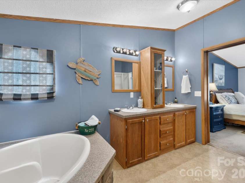 135 Basswood Drive, Nebo, NC 28761.  MLS# CAR4404672, YatesRealty ID 38020. 