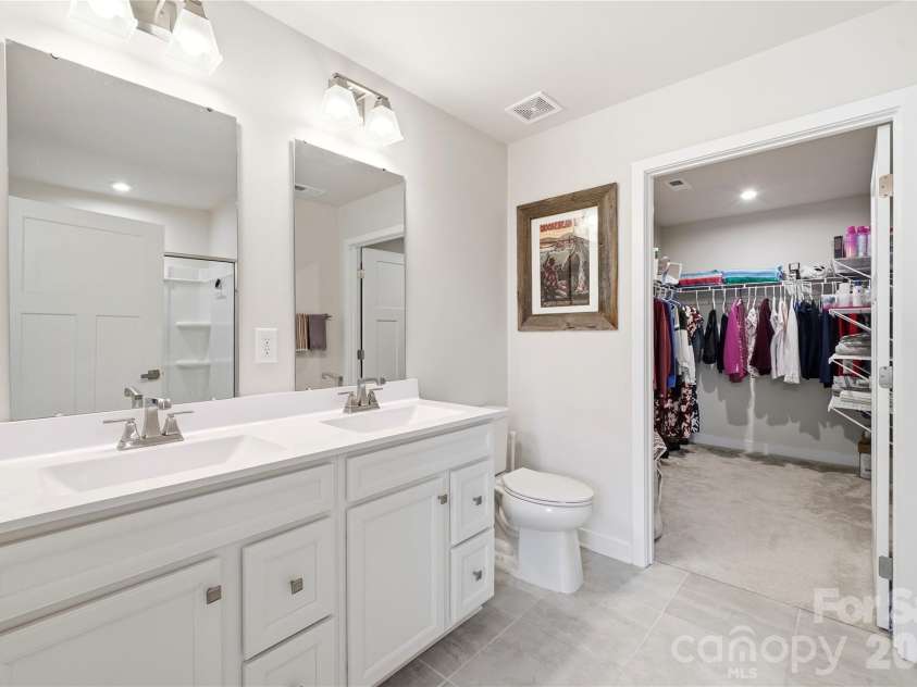 113 Stella Lane, Troutman, NC 28166.  MLS# CAR4397010, YatesRealty ID 38023. Primary bath with two basin vanity