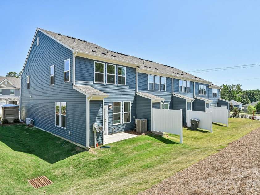 7567 Ethora Way, Charlotte, NC 28216.  MLS# CAR4392026, YatesRealty ID 38028. Model Home - Backyard.