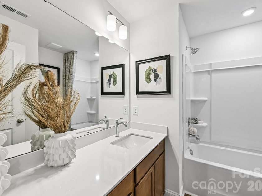 7567 Ethora Way, Charlotte, NC 28216.  MLS# CAR4392026, YatesRealty ID 38028. Model Home - Guest Bath 2.