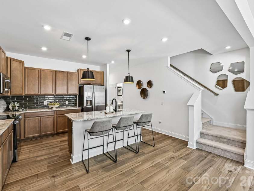 7567 Ethora Way, Charlotte, NC 28216.  MLS# CAR4392026, YatesRealty ID 38028. Model Home - Kitchen.