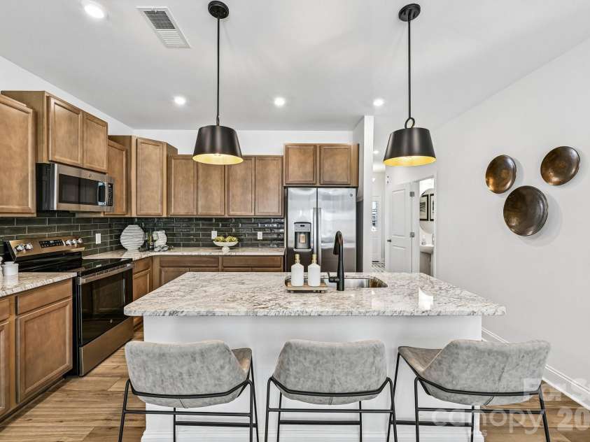 7567 Ethora Way, Charlotte, NC 28216.  MLS# CAR4392026, YatesRealty ID 38028. Model Home - Kitchen.