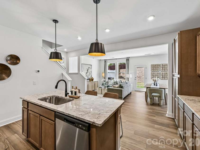 7567 Ethora Way, Charlotte, NC 28216.  MLS# CAR4392026, YatesRealty ID 38028. Model Home - Kitchen Island.