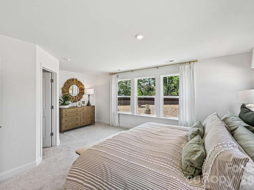 7567 Ethora Way, Charlotte, NC 28216.  MLS# CAR4392026, YatesRealty ID 38028. Model Home - Owner's Suite.