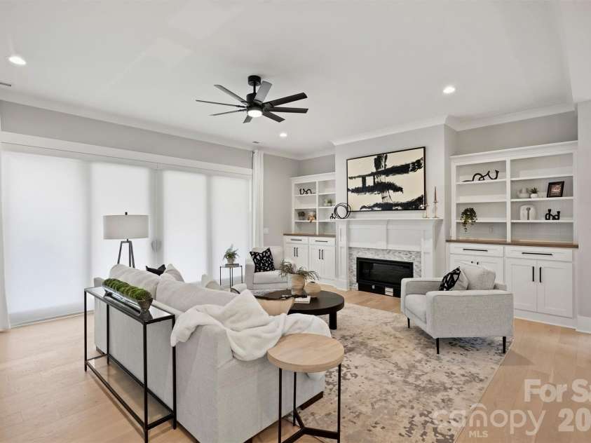 8163 Fairview Road, Charlotte, NC 28226.  MLS# CAR4350674, YatesRealty ID 38031. Custom remote shade on sliding doors for privacy.