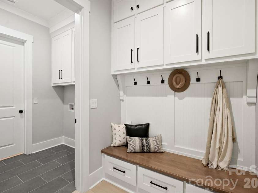 8163 Fairview Road, Charlotte, NC 28226.  MLS# CAR4350674, YatesRealty ID 38031. Drop Zone - more storage!