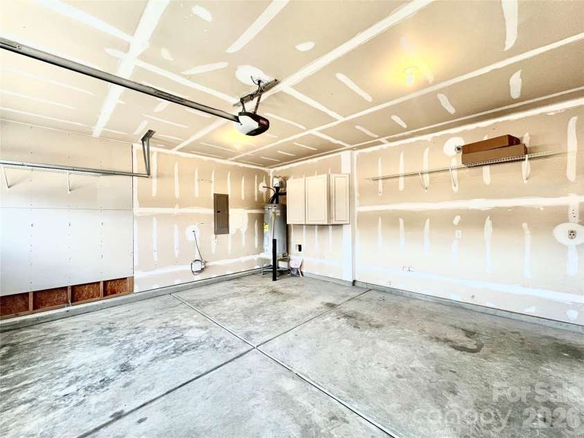 2021 Blue Stream Lane, Indian Trail, NC 28079.  MLS# CAR4379925, YatesRealty ID 38034. Finished Garage