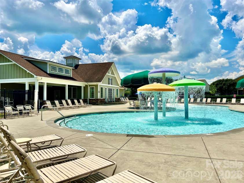 2021 Blue Stream Lane, Indian Trail, NC 28079.  MLS# CAR4379925, YatesRealty ID 38034. Fun for everyone! Large pool and decking!