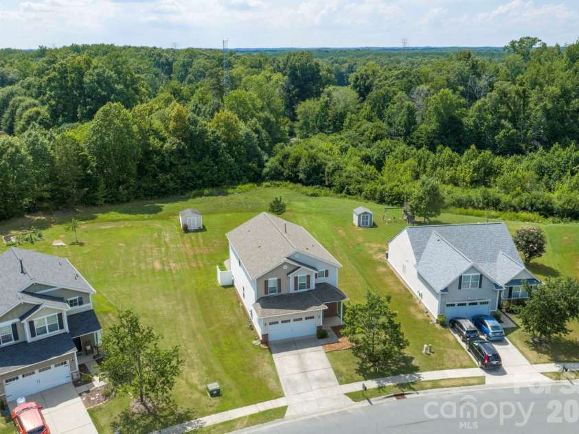 2021 Blue Stream Lane, Indian Trail, NC 28079.  MLS# CAR4379925, YatesRealty ID 38034. Green Space, Trees!