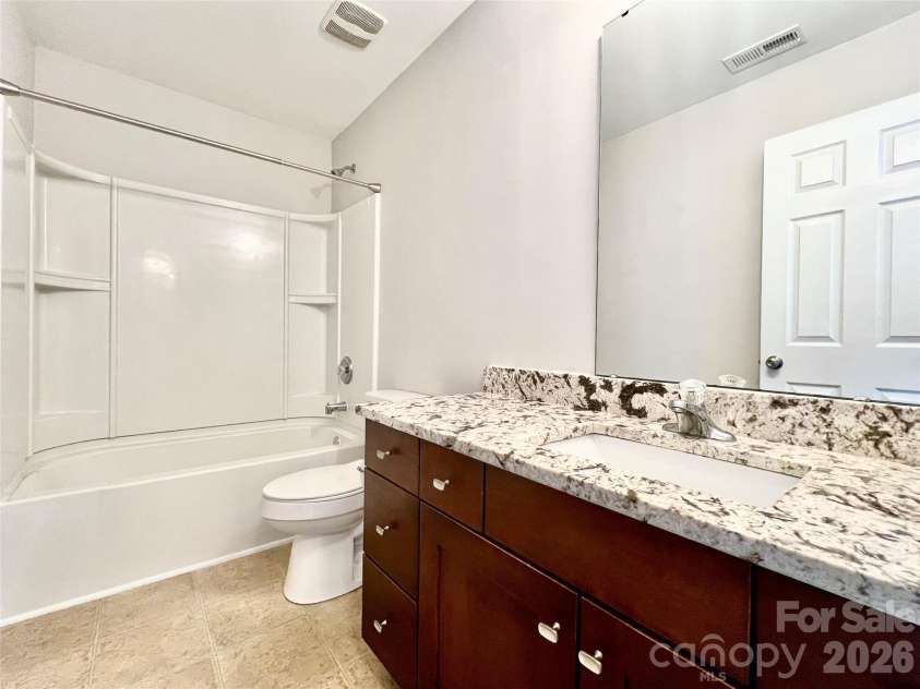 2021 Blue Stream Lane, Indian Trail, NC 28079.  MLS# CAR4379925, YatesRealty ID 38034. Hall Bathroom