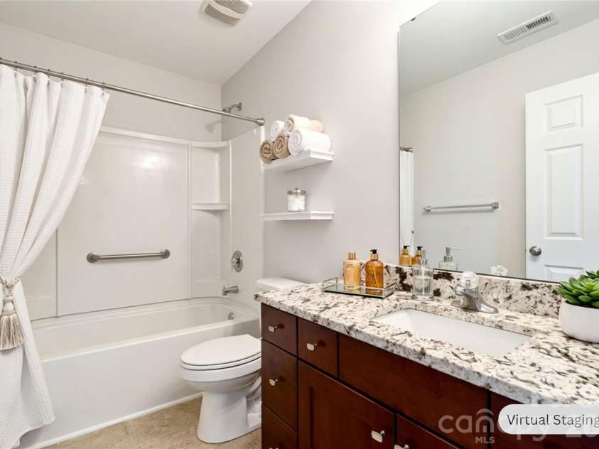 2021 Blue Stream Lane, Indian Trail, NC 28079.  MLS# CAR4379925, YatesRealty ID 38034. Hall Full Bathroom, pretty granite counters