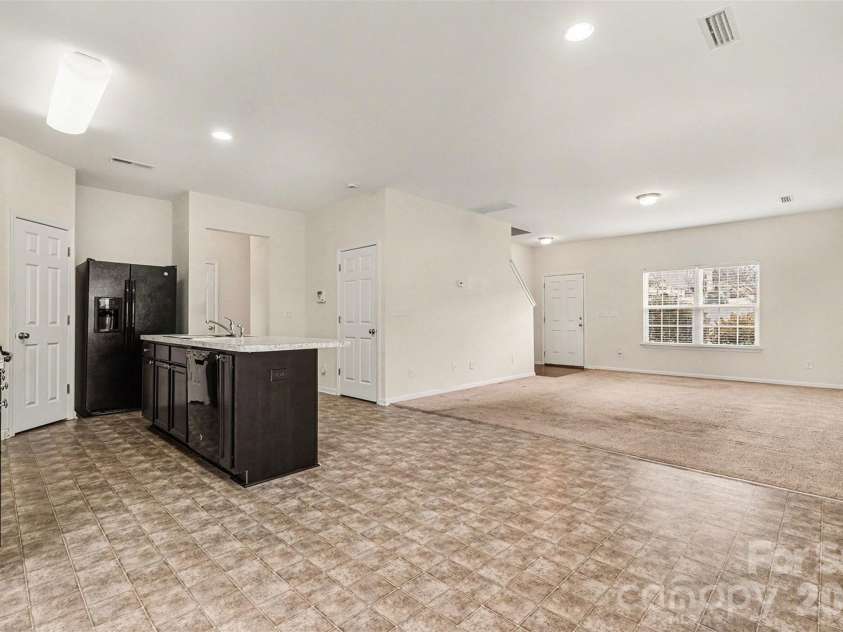 1526 Glenbar Court, Clover, SC 29710.  MLS# CAR4337838, YatesRealty ID 3804. Dining into living room & kitchen