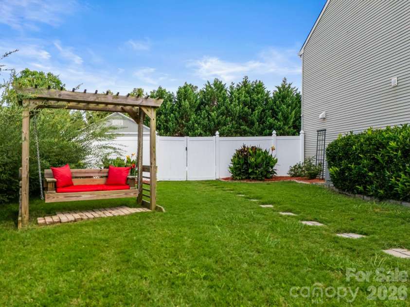 191 Old Carriage Road, Clover, SC 29710.  MLS# CAR4402254, YatesRealty ID 38051. Side Yard with Swing