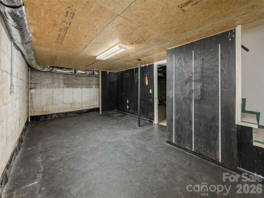 340 Mauney Cove, Waynesville, NC 28786.  MLS# CAR4401250, YatesRealty ID 38064. Basement large storage space