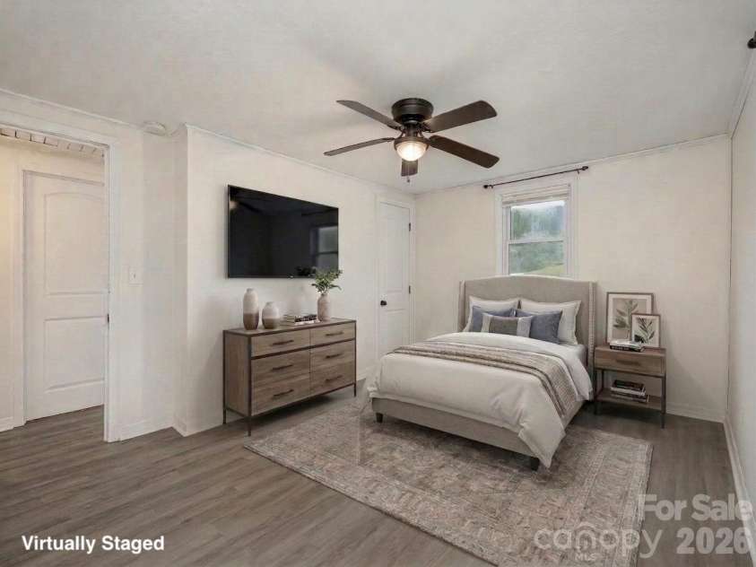 340 Mauney Cove, Waynesville, NC 28786.  MLS# CAR4401250, YatesRealty ID 38064. Virtually staged primary bedroom