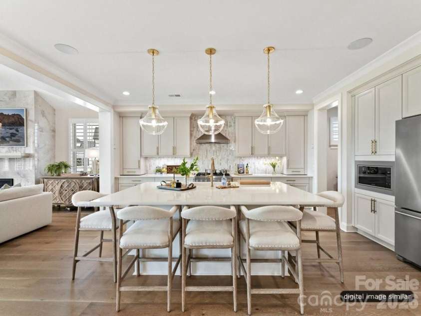6535 Cashion Road, Huntersville, NC 28036.  MLS# CAR4405241, YatesRealty ID 38071. Gorgeous Kitchen with an expanded kitchen island with 5 seats