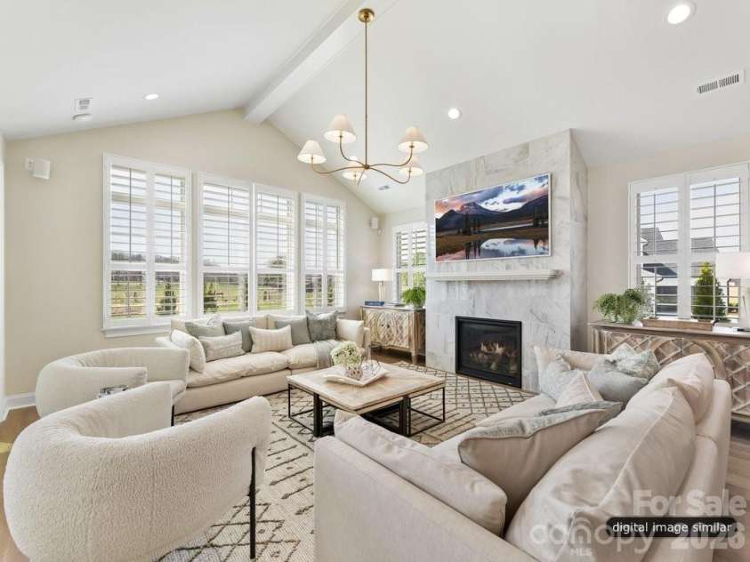 6535 Cashion Road, Huntersville, NC 28036.  MLS# CAR4405241, YatesRealty ID 38071. Vaulted Ceilings in the  Living Room