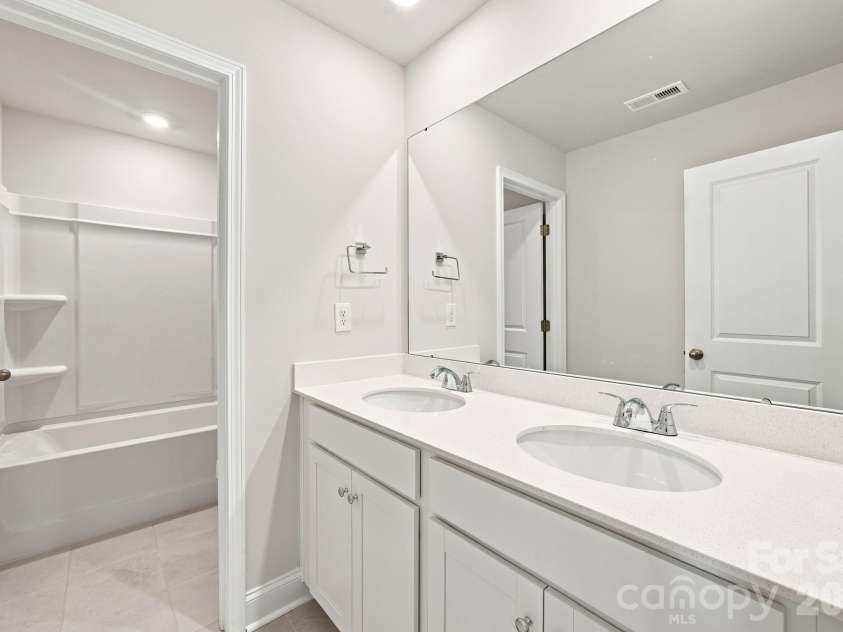1039 Rocking Horse Road, Indian Trail, NC 28079.  MLS# CAR4370781, YatesRealty ID 38079. Hall Bath
