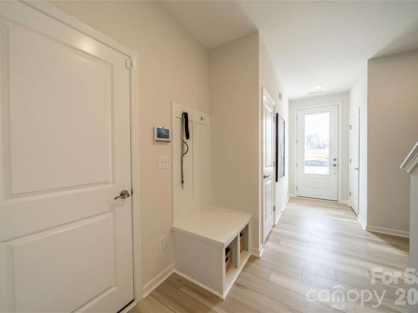 6029 Longar Lane, Charlotte, NC 28269.  MLS# CAR4400049, YatesRealty ID 38088. Drop zone near garage entrance