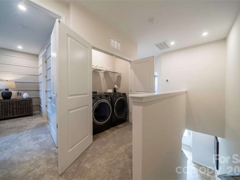 6029 Longar Lane, Charlotte, NC 28269.  MLS# CAR4400049, YatesRealty ID 38088. Laundry closet with included washer and dryer