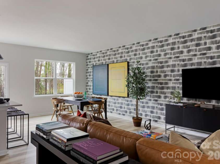 6029 Longar Lane, Charlotte, NC 28269.  MLS# CAR4400049, YatesRealty ID 38088. Light filed great room