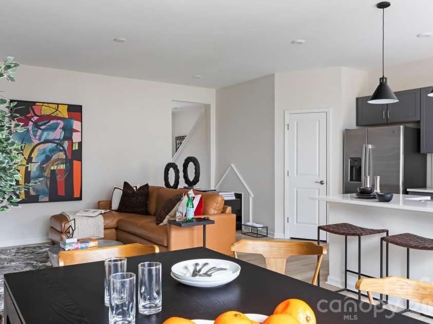 6029 Longar Lane, Charlotte, NC 28269.  MLS# CAR4400049, YatesRealty ID 38088. Light filed great room