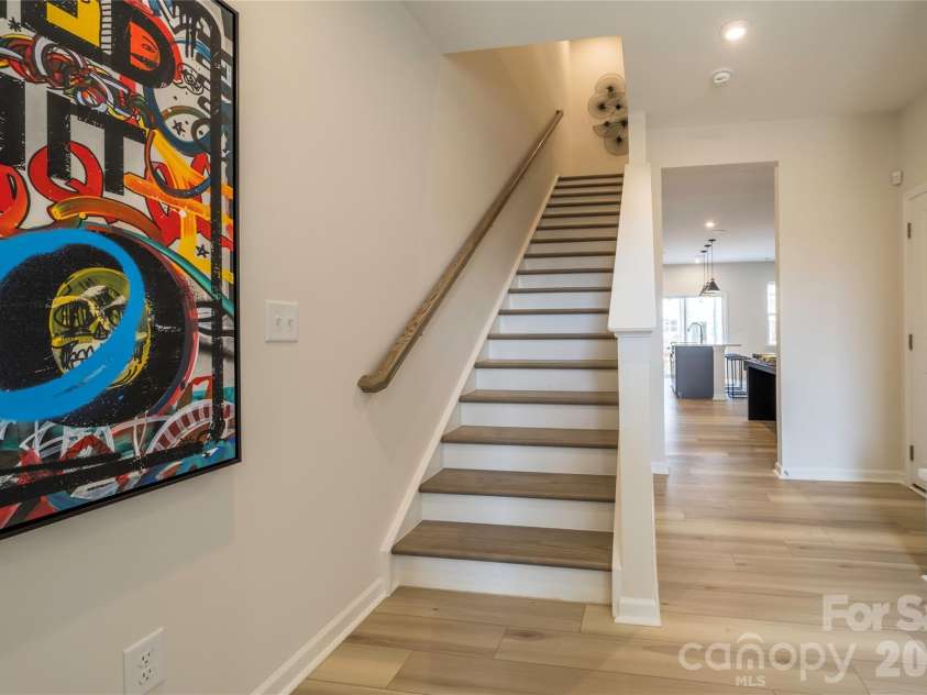 6029 Longar Lane, Charlotte, NC 28269.  MLS# CAR4400049, YatesRealty ID 38088. Oak box stairs