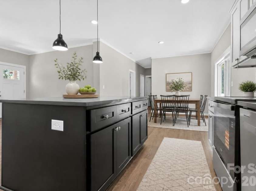 159 Evenfall Lane, Columbus, NC 28722.  MLS# CAR4405102, YatesRealty ID 38098. Kitchen/DR virtually staged