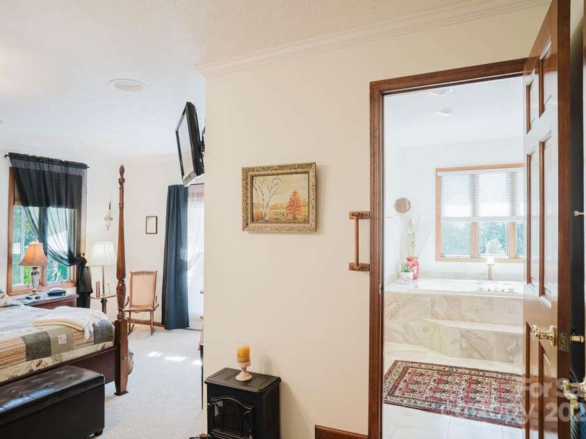 115 Hawkins Creek Road, Hendersonville, NC 28791.  MLS# CAR4295090, YatesRealty ID 3810. 