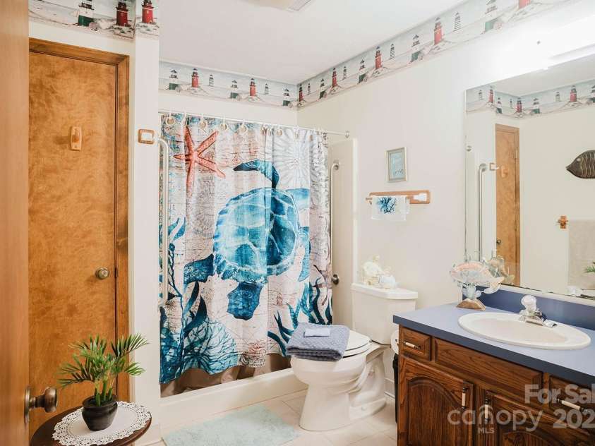 115 Hawkins Creek Road, Hendersonville, NC 28791.  MLS# CAR4295090, YatesRealty ID 3810. 