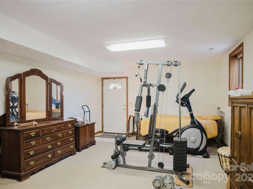 115 Hawkins Creek Road, Hendersonville, NC 28791.  MLS# CAR4295090, YatesRealty ID 3810. 