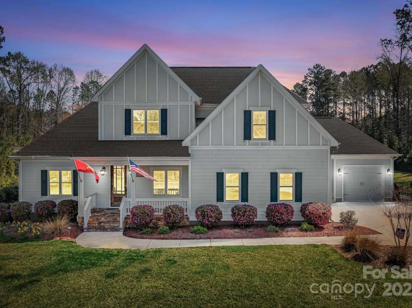 127 Castle Drive, Mooresville, NC 28117.  MLS# CAR4240273, YatesRealty ID 3810. Virtually edited twilight