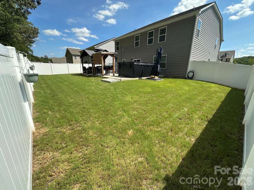 243 Autumn Sage Drive, Locust, NC 28097.  MLS# CAR4402759, YatesRealty ID 38105. Backyard