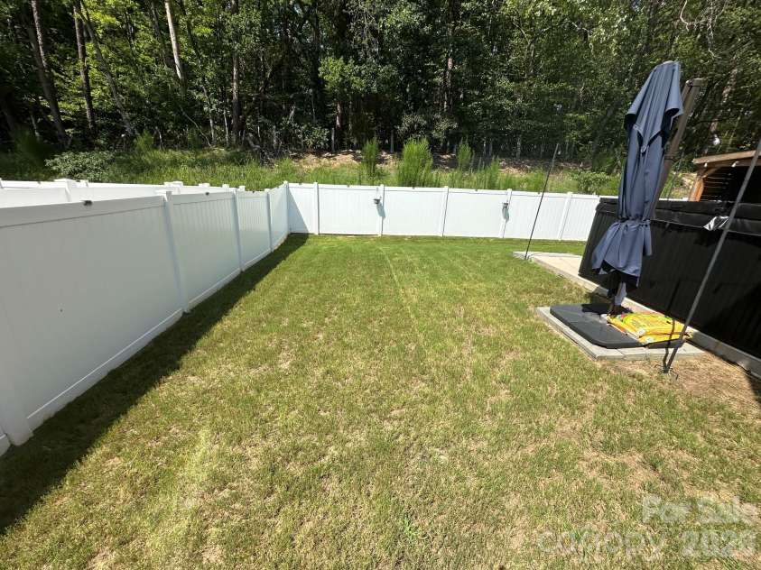 243 Autumn Sage Drive, Locust, NC 28097.  MLS# CAR4402759, YatesRealty ID 38105. Backyard
