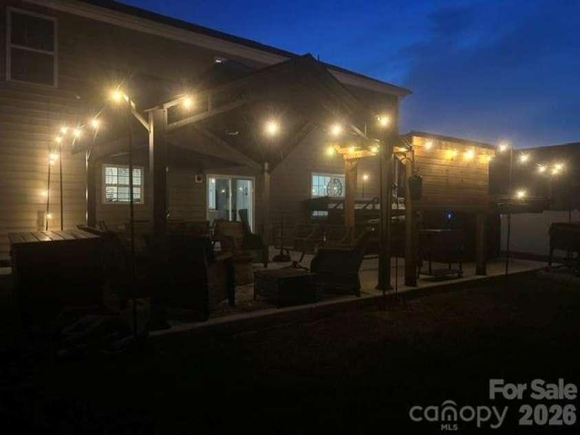 243 Autumn Sage Drive, Locust, NC 28097.  MLS# CAR4402759, YatesRealty ID 38105. Patio with lights