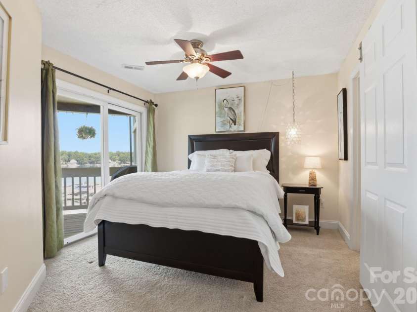 2135 Regatta Lane, Denver, NC 28037.  MLS# CAR4416821, YatesRealty ID 3812. Primary Bedroom. Has access to balcony