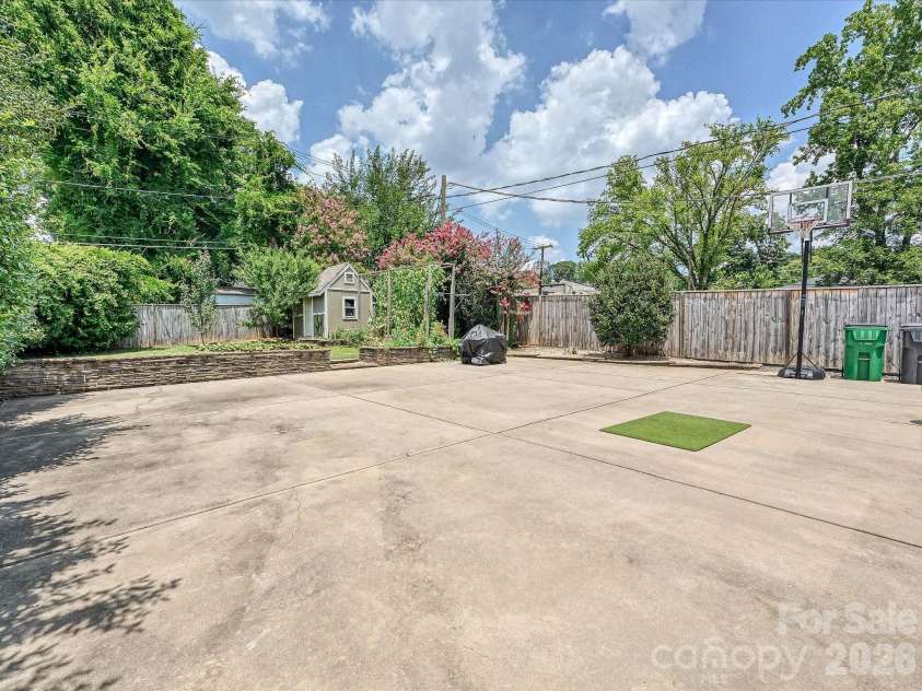 1822 Lombardy Circle, Charlotte, NC 28203.  MLS# CAR4403539, YatesRealty ID 38120. Parking and play area