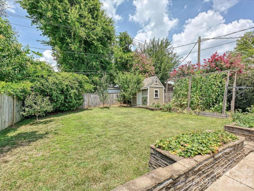 1822 Lombardy Circle, Charlotte, NC 28203.  MLS# CAR4403539, YatesRealty ID 38120. Rear yard with shed and garden