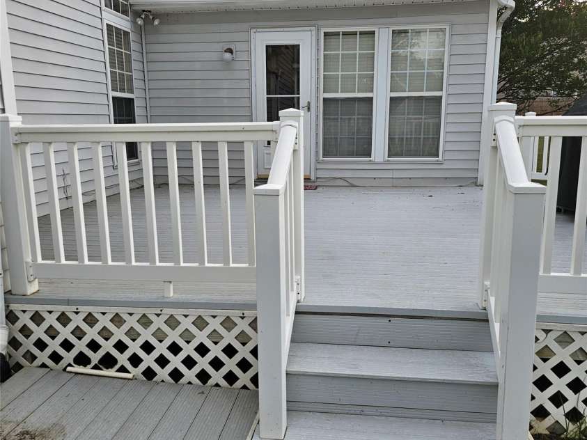 4022 Meadowview Hills Drive, Charlotte, NC 28269.  MLS# CAR4403155, YatesRealty ID 38122. Maintenance Free Deck