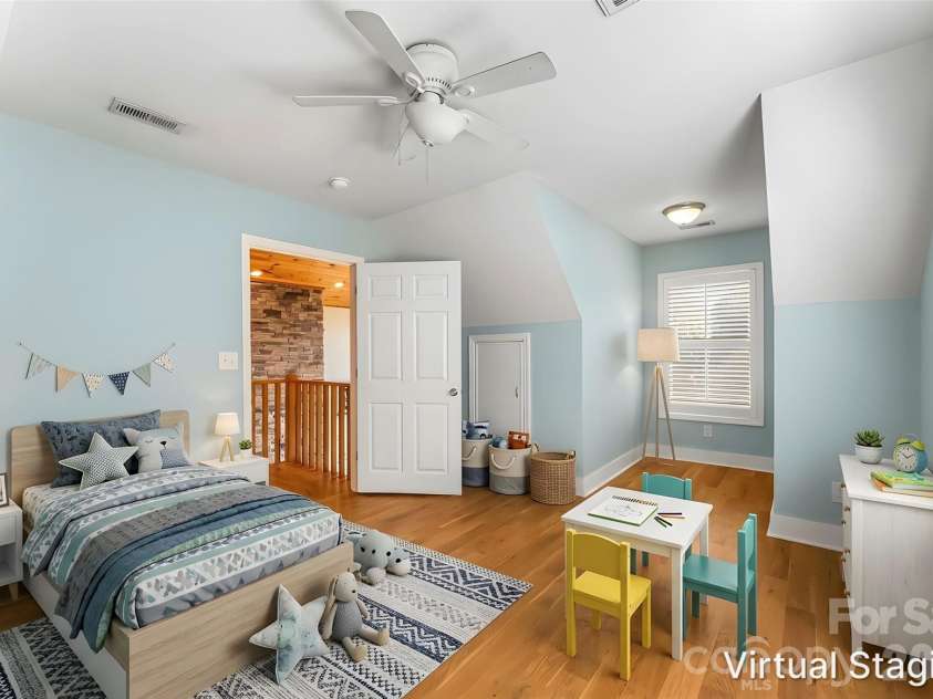 94 Fairway Drive, Nebo, NC 28761.  MLS# CAR4404522, YatesRealty ID 38125. Bedroom upstairs-virtually staged